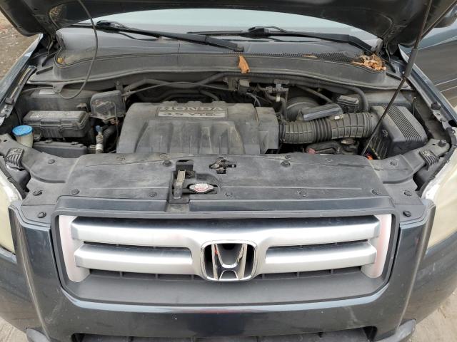 Photo 12 from auction – 2006 HONDA PILOT EX with VIN 5FNYF18536B016677