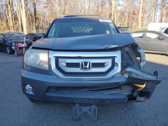 Photo 5 from auction – 2011 HONDA PILOT TOUR with VIN 5FNYF4H94BB053073