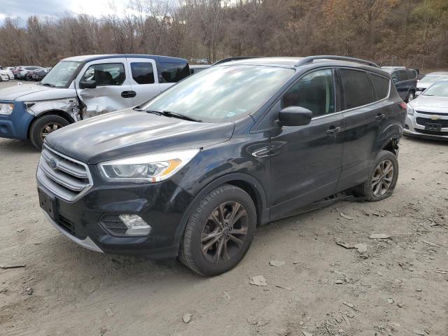 FORD ESCAPE SE 2017 with VIN 1FMCU9GD1HUD48100 - Photo from auction