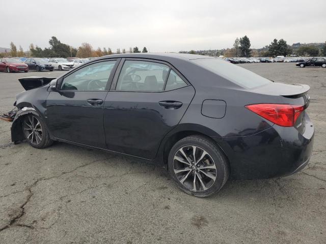 Photo 2 from auction – 2017 TOYOTA COROLLA L with VIN 5YFBURHE1HP719972