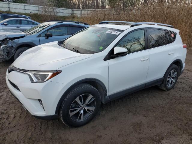 TOYOTA RAV4 XLE 2017 with VIN JTMRFREV1HJ707645 - Photo from auction
