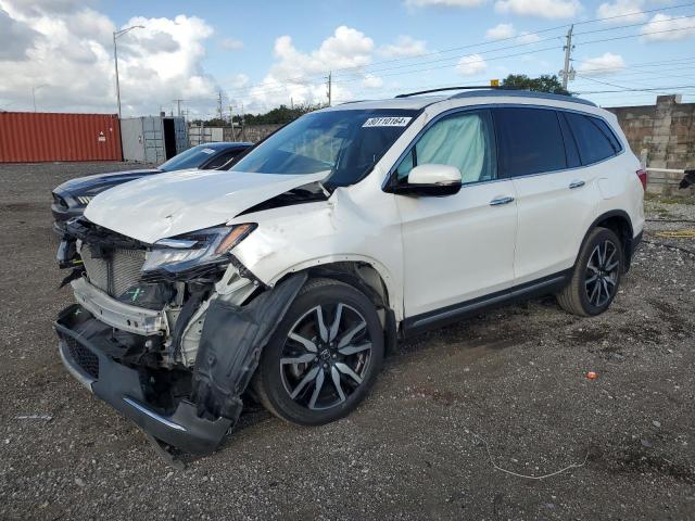 HONDA PILOT ELIT 2019 with VIN 5FNYF6H00KB037871 - Photo from auction