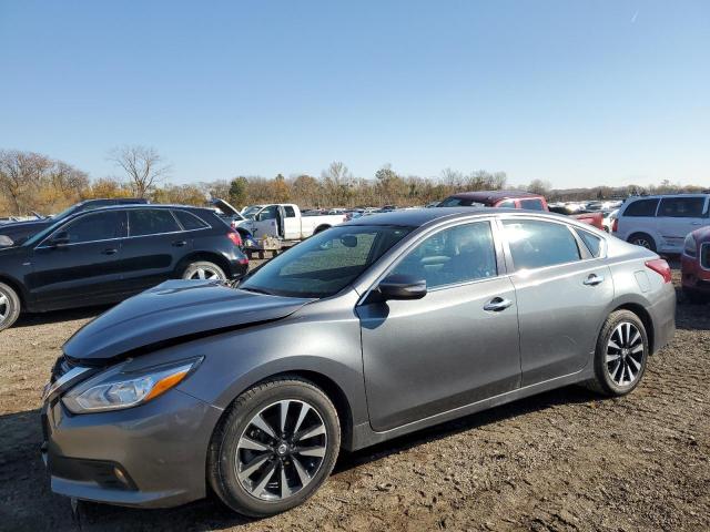 NISSAN ALTIMA 2.5 2018 with VIN 1N4AL3AP1JC210458 - Photo from auction