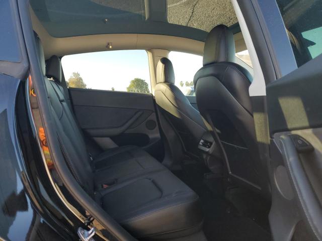 Photo 11 from auction – 2022 TESLA MODEL Y with VIN 7SAYGDEF2NF554039
