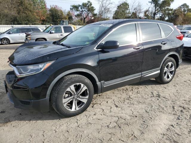 HONDA CR-V LX 2017 with VIN 7FARW5H31HE013990 - Photo from auction