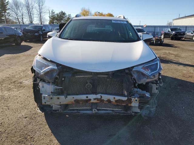 Photo 5 from auction – 2018 TOYOTA RAV4 LE with VIN 2T3BFREV6JW821133