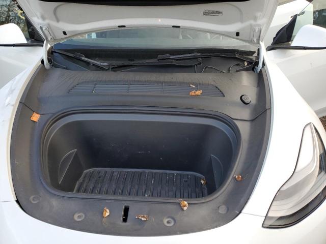 Photo 11 from auction – 2022 TESLA MODEL Y with VIN 7SAYGAEE3NF514817