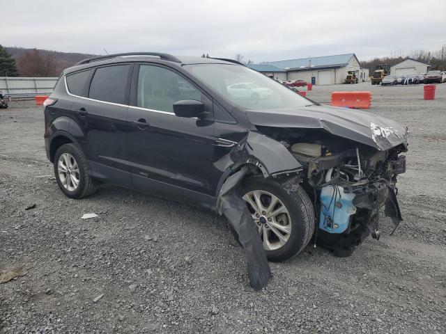 Photo 4 from auction – 2018 FORD ESCAPE SE with VIN 1FMCU9GD9JUA73971