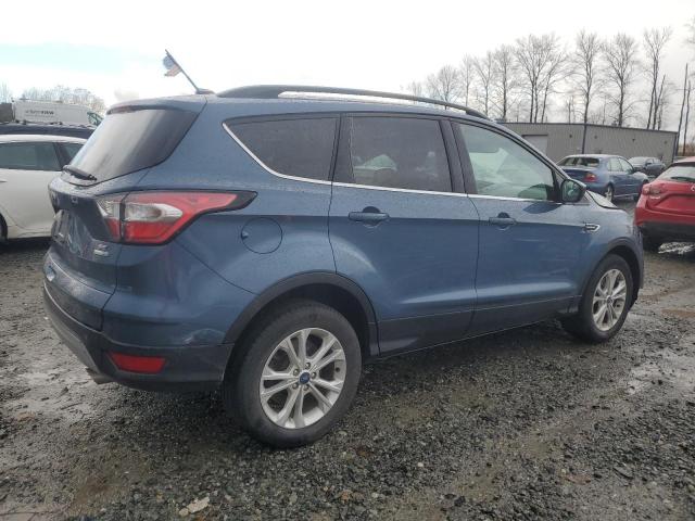 Photo 3 from auction – 2018 FORD ESCAPE SE with VIN 1FMCU9GD3JUC10113