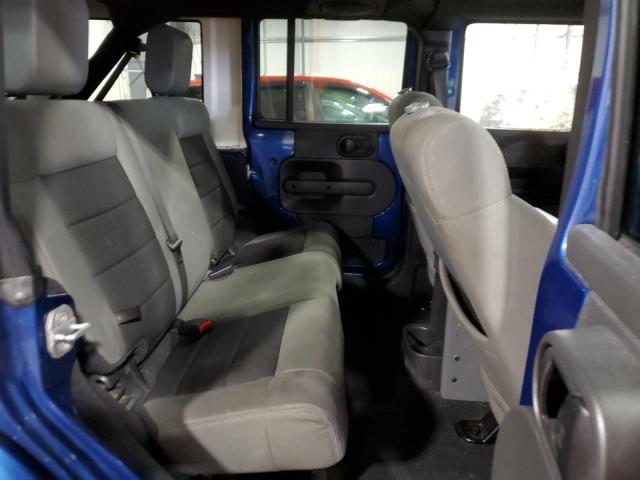 Photo 11 from auction – 2010 JEEP WRANGLER U with VIN 1J4BA5H1XAL117904