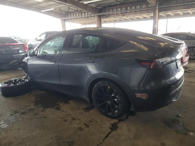 Photo 2 from auction – 2023 TESLA MODEL Y with VIN 7SAYGAEE5PF838581