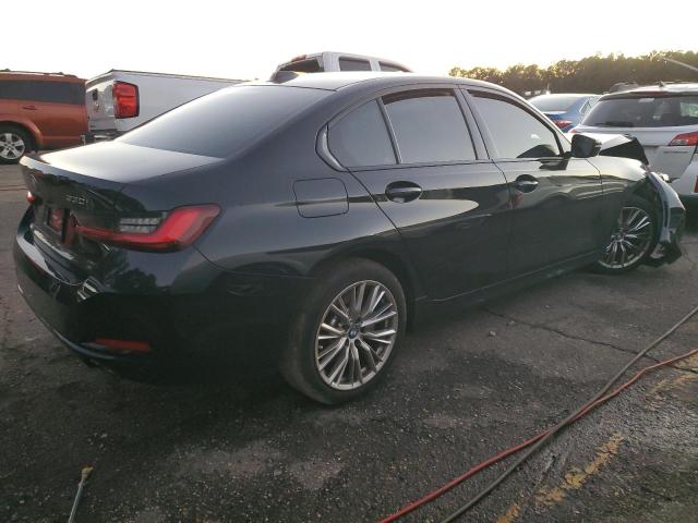 Photo 3 from auction – 2023 BMW 330I with VIN 3MW69FF06P8D02349