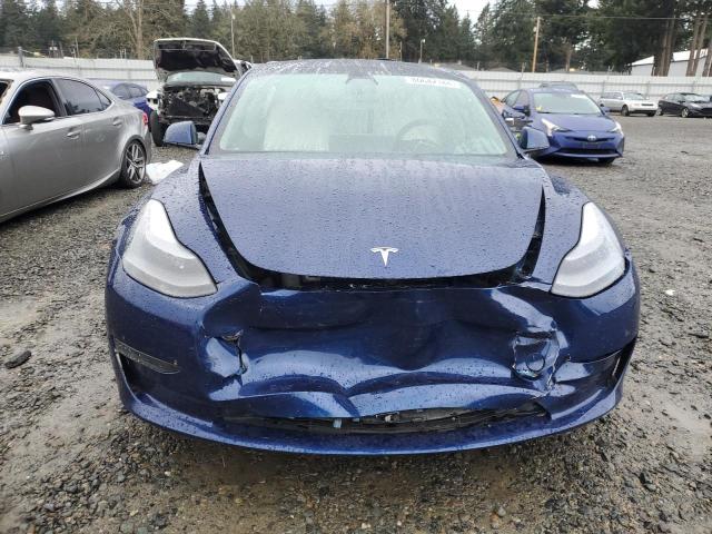 Photo 5 from auction – 2021 TESLA MODEL 3 with VIN 5YJ3E1EAXMF028837