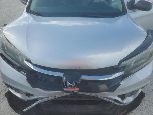 Photo 11 from auction – 2016 HONDA CR-V LX with VIN 2HKRM4H39GH623020
