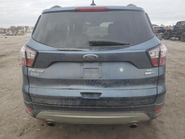 Photo 6 from auction – 2018 FORD ESCAPE SE with VIN 1FMCU9GD7JUC29537