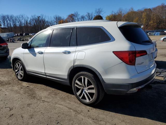 Photo 2 from auction – 2017 HONDA PILOT TOUR with VIN 5FNYF6H96HB017308
