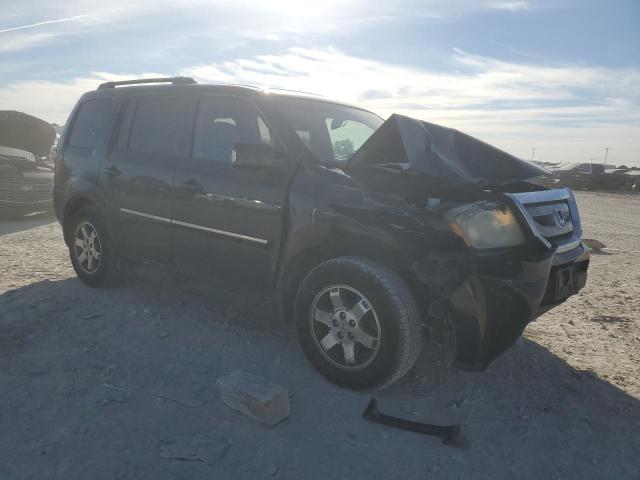 Фото 4 с аукциона – 2011 HONDA PILOT TOUR с VIN 5FNYF3H94BB044559