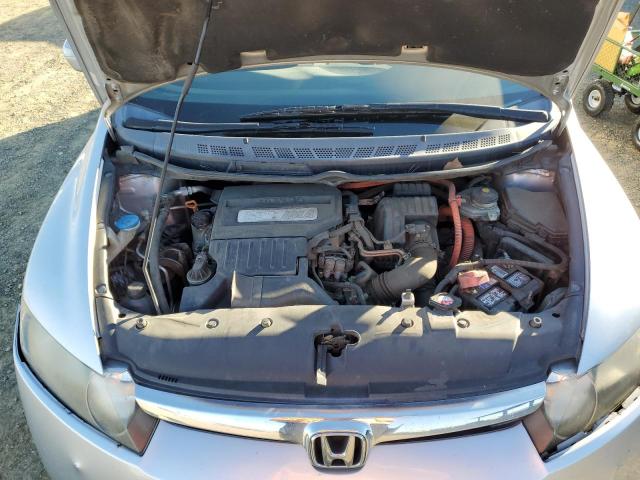 Photo 11 from auction – 2006 HONDA CIVIC HYBR with VIN JHMFA36286S009221