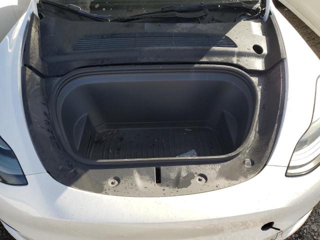 Photo 11 from auction – 2023 TESLA MODEL Y with VIN 7SAYGDEE7PF871681