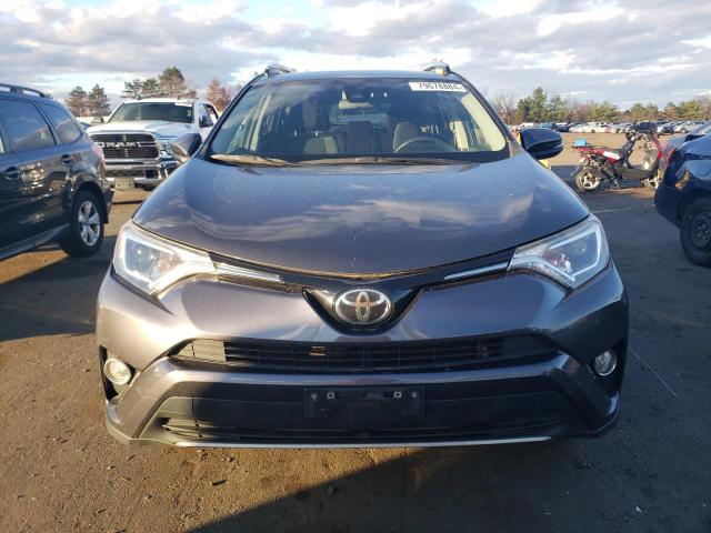 Photo 5 from auction – 2017 TOYOTA RAV4 XLE with VIN JTMRFREV7HJ124612