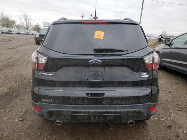 Photo 6 from auction – 2018 FORD ESCAPE SEL with VIN 1FMCU0HD8JUC69488