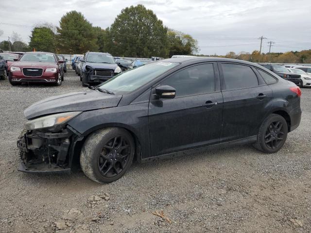 FORD FOCUS SE 2016 with VIN 1FADP3F28GL357383 - Photo from auction