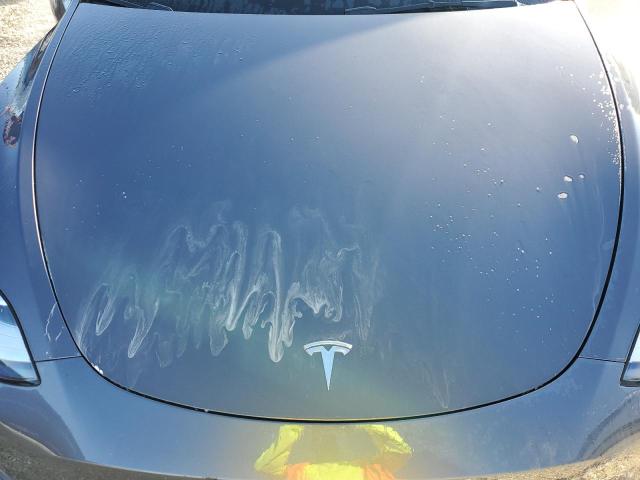 Photo 12 from auction – 2023 TESLA MODEL Y with VIN 7SAYGDEE1PF606044