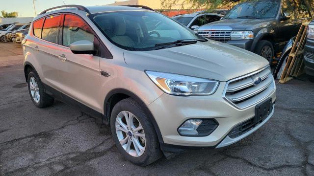FORD ESCAPE SE 2018 with VIN 1FMCU9GD3JUC10645 - Photo from auction