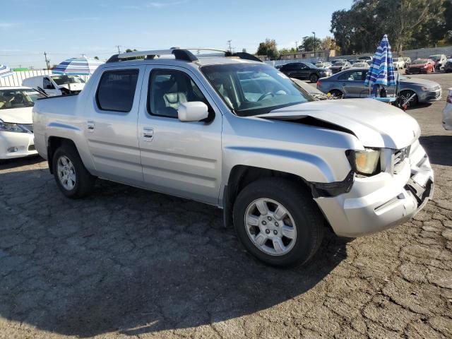 Photo 4 from auction – 2006 HONDA RIDGELINE with VIN 2HJYK16516H530516