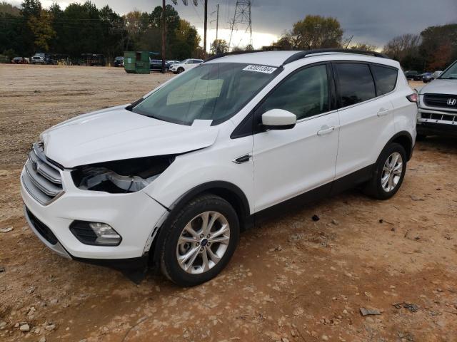 FORD ESCAPE SE 2018 with VIN 1FMCU9GD3JUC54614 - Photo from auction
