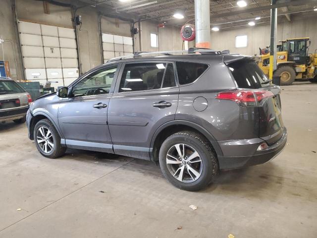 Photo 2 from auction – 2017 TOYOTA RAV4 XLE with VIN JTMRFREV9HJ112557