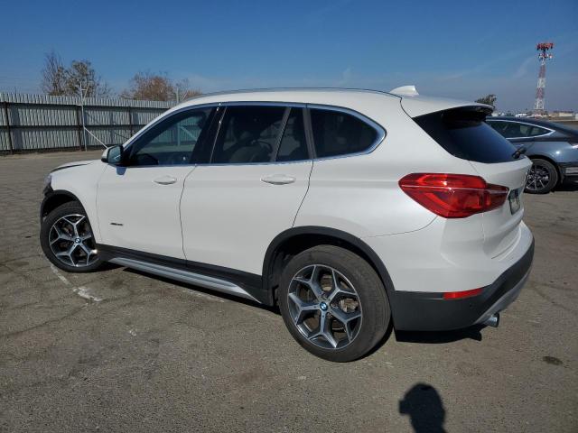 Photo 2 from auction – 2017 BMW X1 XDRIVE2 with VIN WBXHT3C30H5F68223