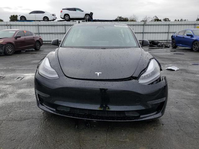 Photo 5 from auction – 2021 TESLA MODEL 3 with VIN 5YJ3E1EA1MF002207