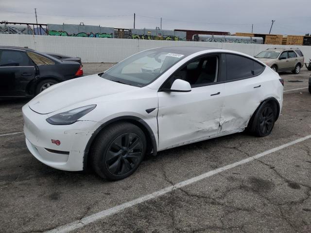 TESLA MODEL Y 2024 with VIN 7SAYGDED4RF126087 - Photo from auction