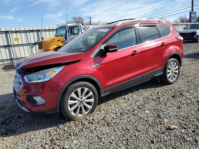 FORD ESCAPE TIT 2017 with VIN 1FMCU9JD5HUD02889 - Photo from auction