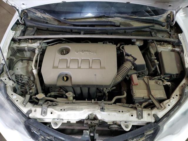 Photo 11 from auction – 2014 TOYOTA COROLLA L with VIN 2T1BURHE6EC165954