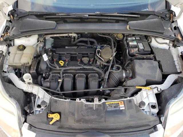 Photo 11 from auction – 2014 FORD FOCUS SE with VIN 1FADP3F29EL115490