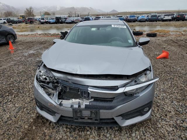 Photo 5 from auction – 2017 HONDA CIVIC EX with VIN 19XFC1F38HE012540