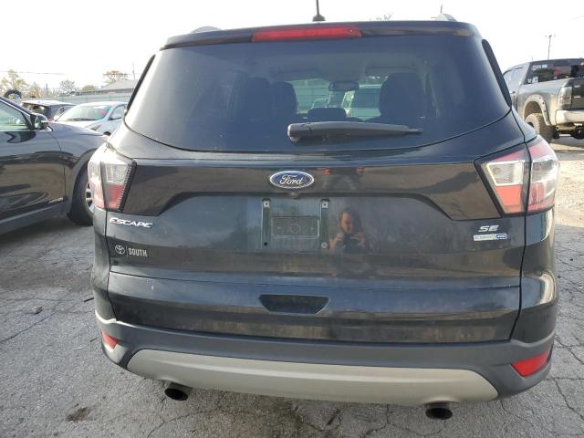 Photo 6 from auction – 2018 FORD ESCAPE SE with VIN 1FMCU9GD2JUA04930