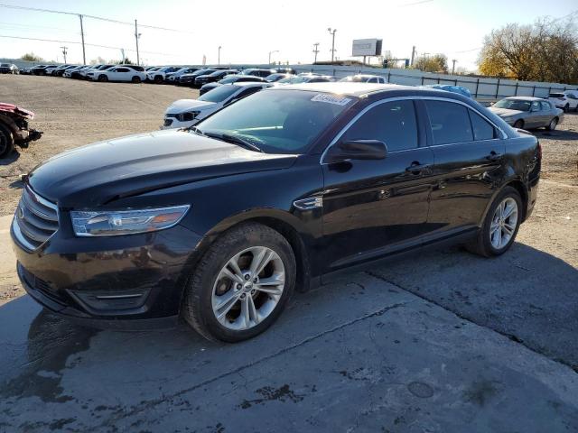 FORD TAURUS SEL 2014 with VIN 1FAHP2E82EG171328 - Photo from auction