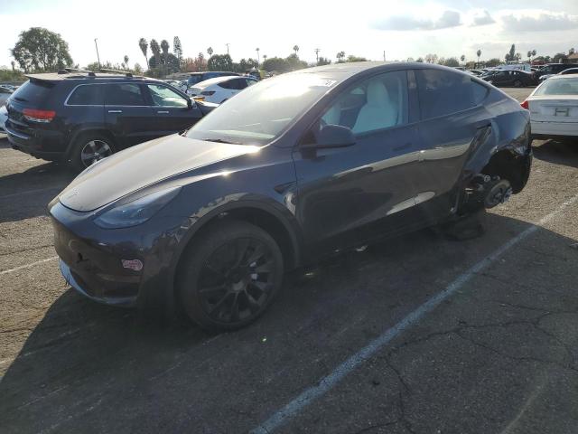 TESLA MODEL Y 2024 with VIN 7SAYGDED2RF055374 - Photo from auction