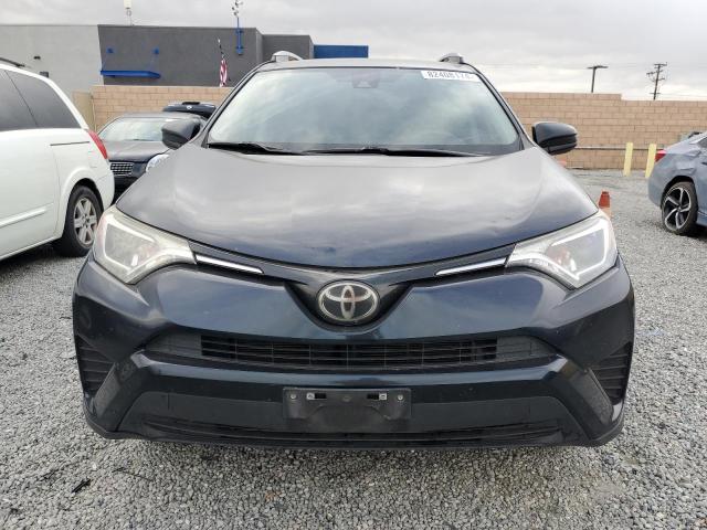 Photo 5 from auction – 2017 TOYOTA RAV4 LE with VIN JTMZFREV6HJ712291