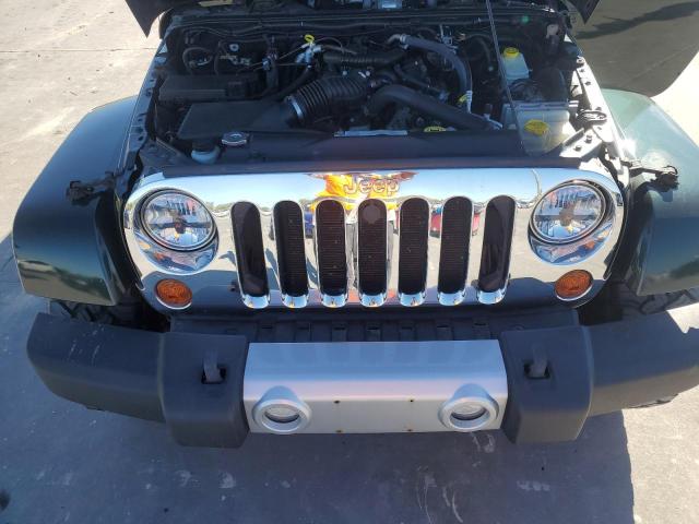 Photo 11 from auction – 2011 JEEP WRANGLER U with VIN 1J4BA5H19BL509287