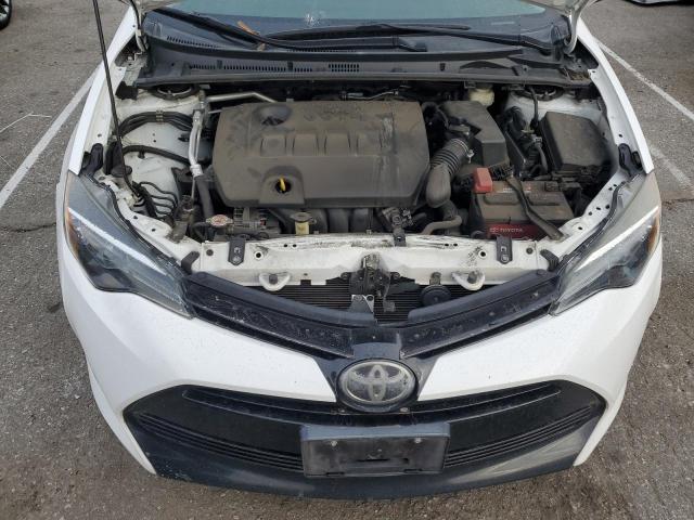 Photo 11 from auction – 2018 TOYOTA COROLLA L with VIN 2T1BURHE6JC052659