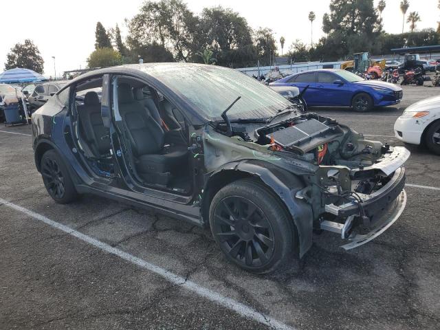 Photo 4 from auction – 2022 TESLA MODEL Y with VIN 7SAYGDEE4NF504962