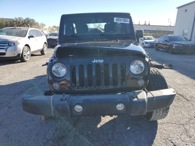 Photo 5 from auction – 2015 JEEP WRANGLER U with VIN 1C4BJWDG1FL718485