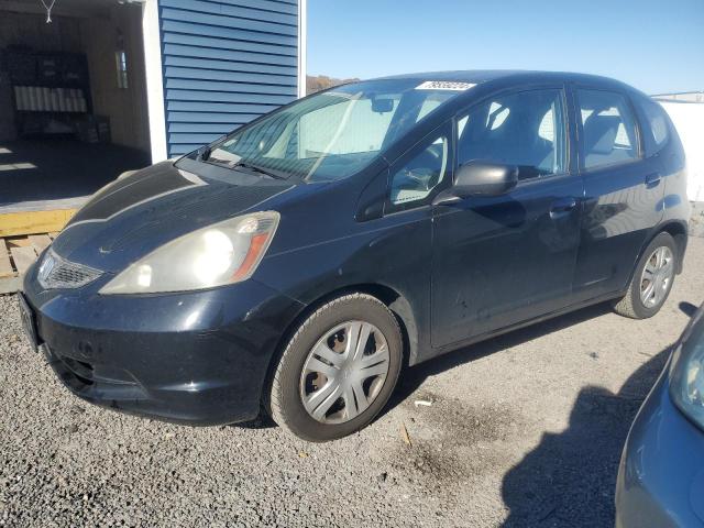 HONDA FIT 2011 with VIN JHMGE8H33BS007303 - Photo from auction