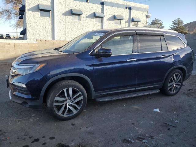 Photo 1 from auction – 2017 HONDA PILOT TOUR with VIN 5FNYF6H94HB041445