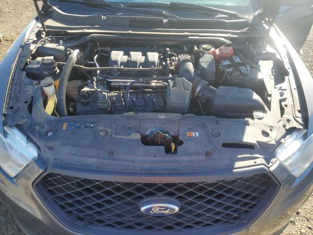 Photo 11 from auction – 2015 FORD TAURUS POL with VIN 1FAHP2MK7FG151672