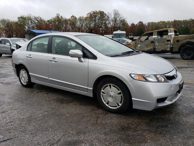 Photo 4 from auction – 2011 HONDA CIVIC HYBR with VIN JHMFA3F26BS000804